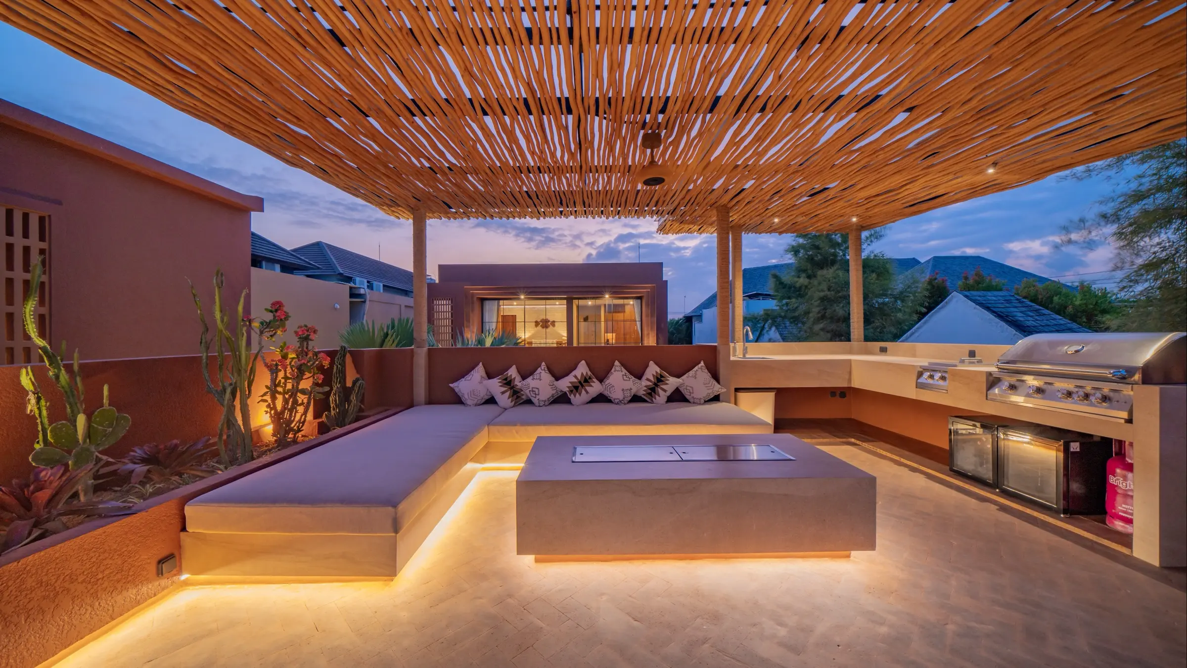 Open sky above the terracotta rooflines of Villa Navaho, Bumbak