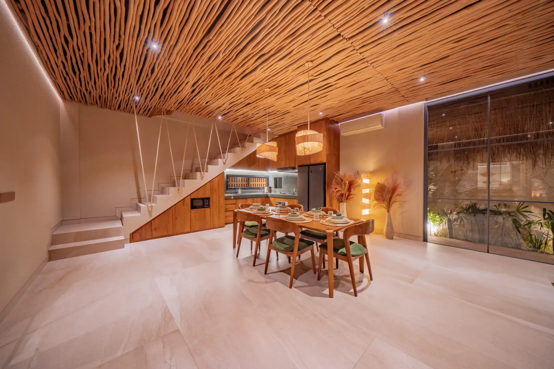 Kitchen running the length of the wall under the stairs at Villa Navaho