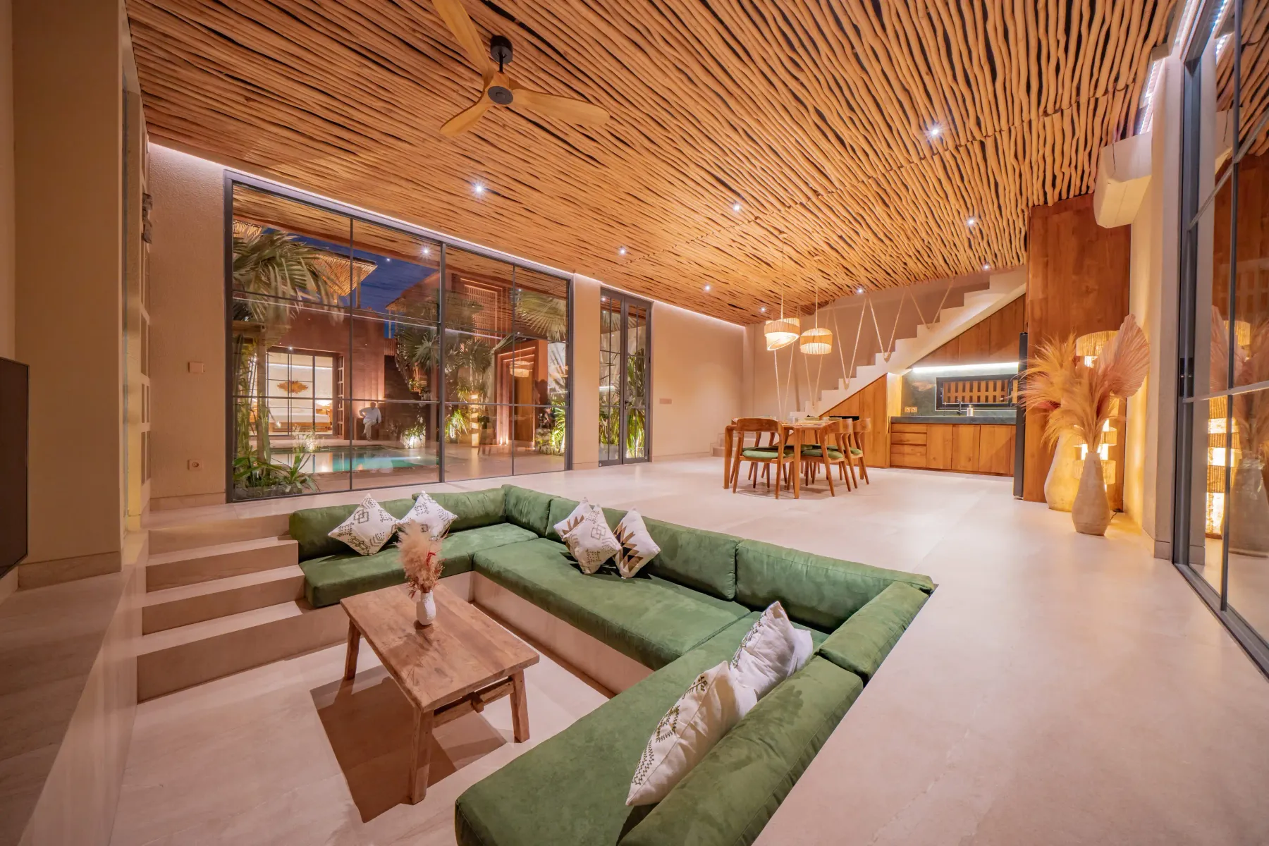 Living room looking through to the kitchen and pool at Villa Navaho, Bumbak Bali