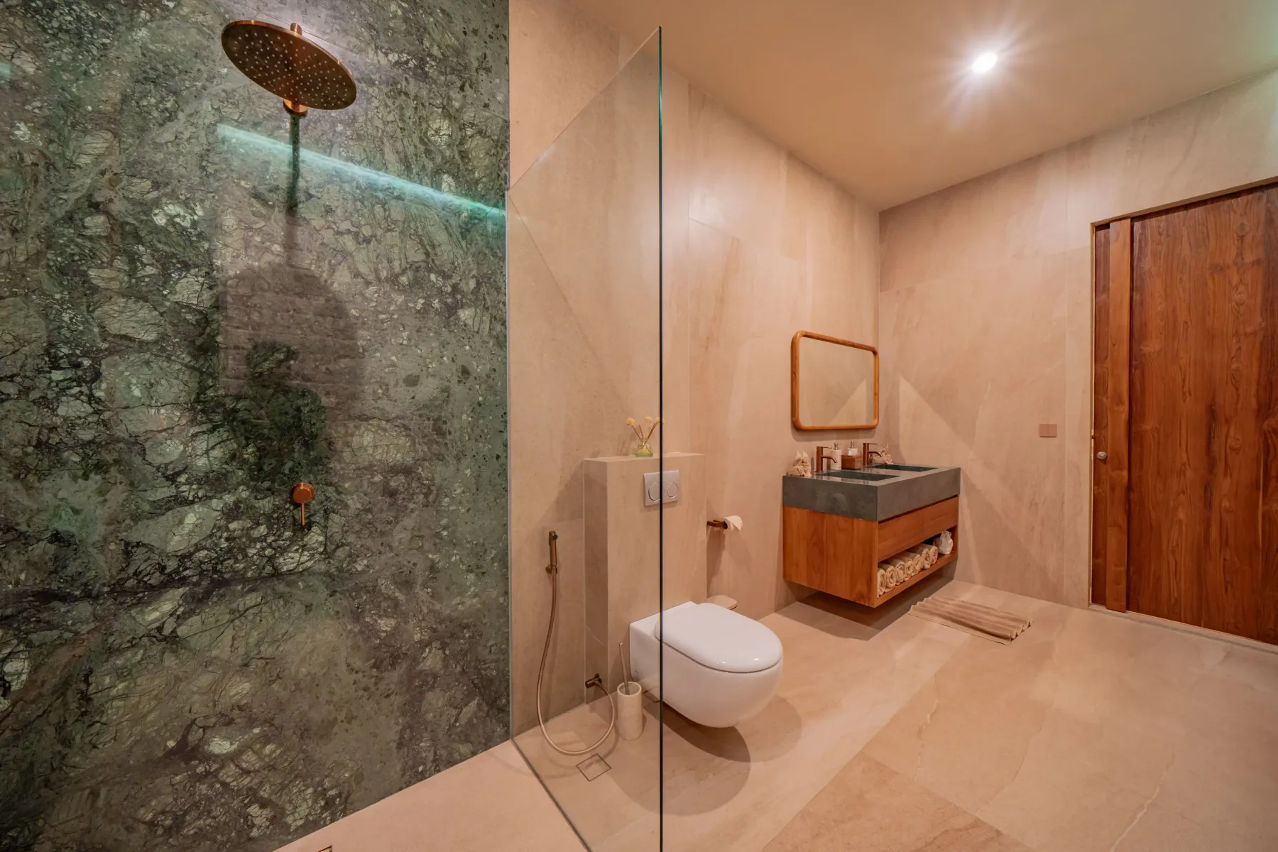 Green marble rain shower in the master ensuite at Villa Navaho, Bumbak Bali
